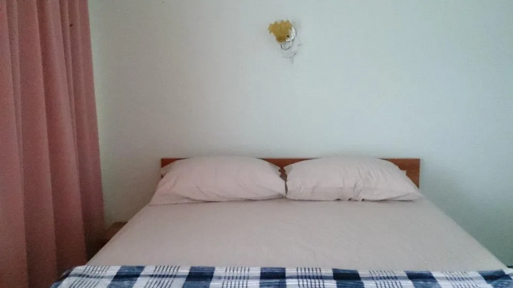 Room with a queen-size bed